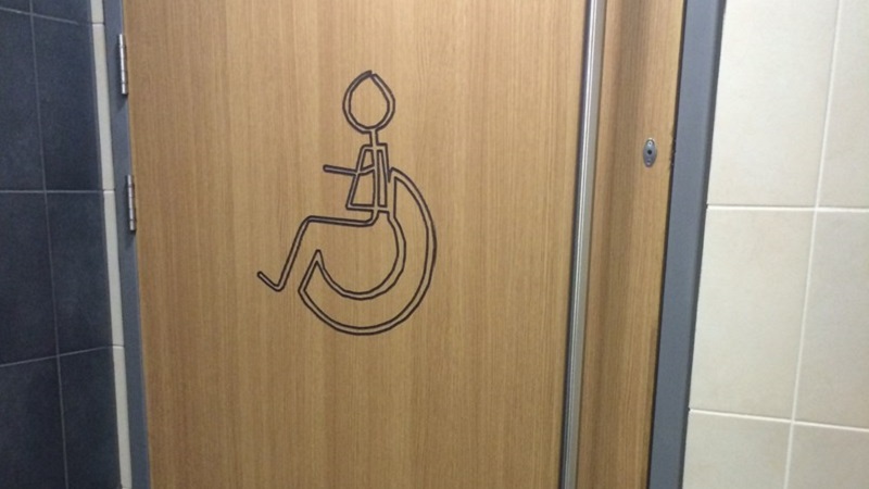 Photo of an accessible toilet door.