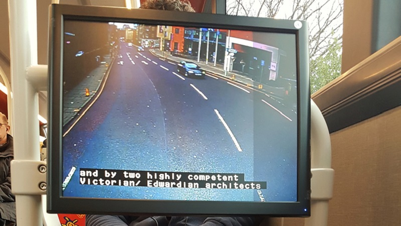 Photo of screen with subtitles.