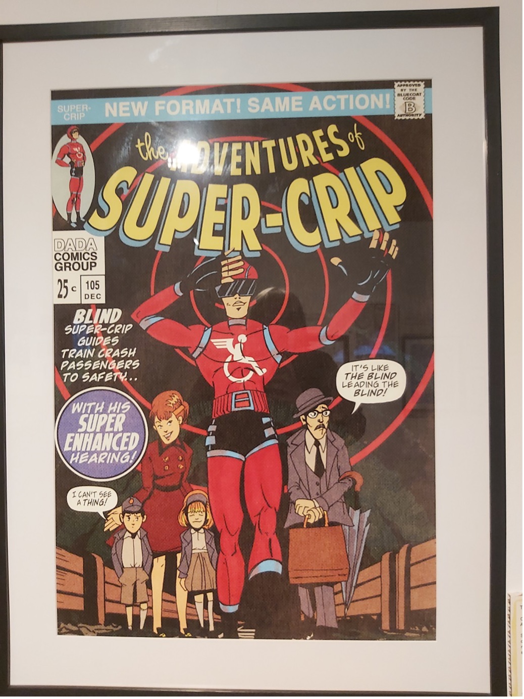 A framed comic picture or cover with the text 'The adventures of Super-Crip' and an illustration of a superhero with a woman and two children to their right and a man to the left