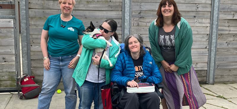 A photo of the Euan's Guide team with Daisy the dog