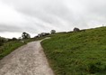 Steep hills and loose gravel make it hard work getting up even in an off-road wheelchair.
