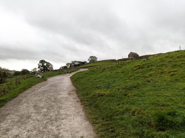 Steep hills and loose gravel make it hard work getting up even in an off-road wheelchair.