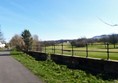 Looking south along the path, with Carrick Knowe Golf Course to the right.