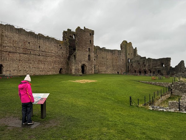 Coast side of castle. Signs in English