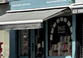 Image of the outside of Pages of Hackney including front door