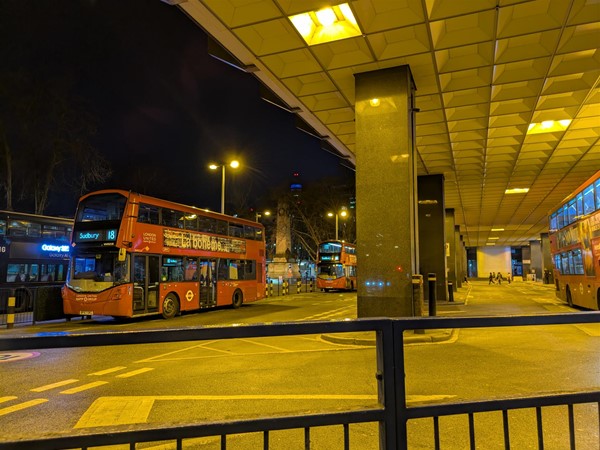 Image of buses at night