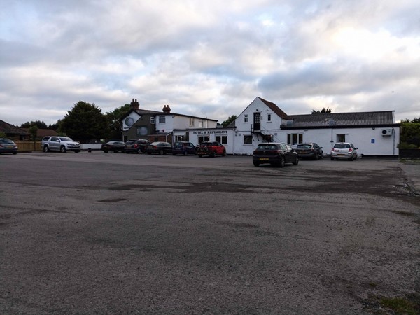 Picture of the pub from across the car park.