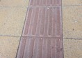 Image of some red and yellow tactile paving