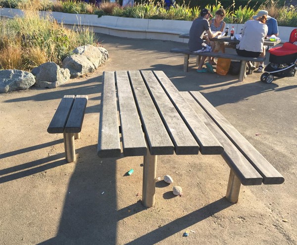 Easy-access picnic bench with space for a wheelchair user.