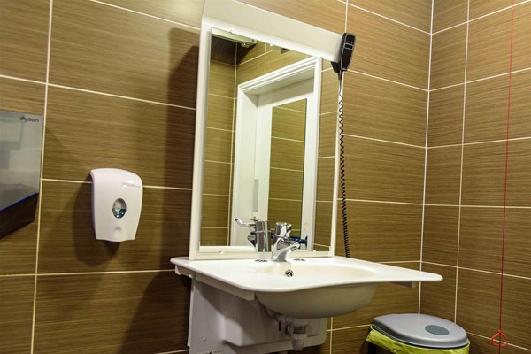 Note the remote on the top right of the mirror.
