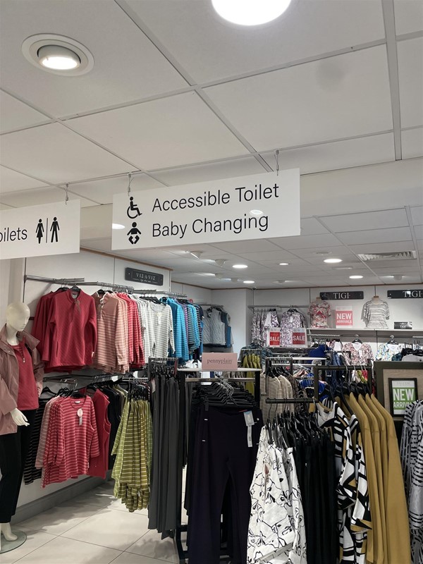 Image of clothes and a sign
