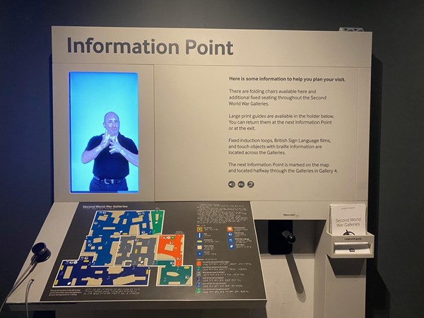 Information point with sign language, audio, text and braille format information