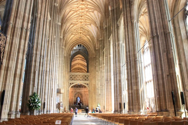 Inside the main area of the cathedral, looking towards the alter. Huge stone columns and beautiful arched roof.