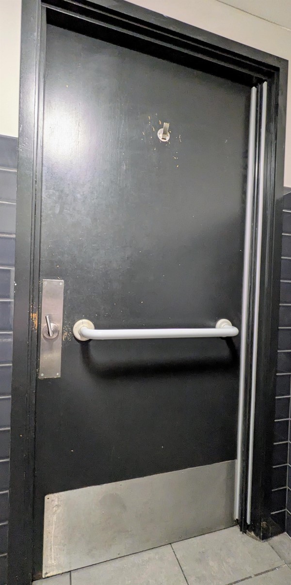 Image of accessible toilet door from the inside