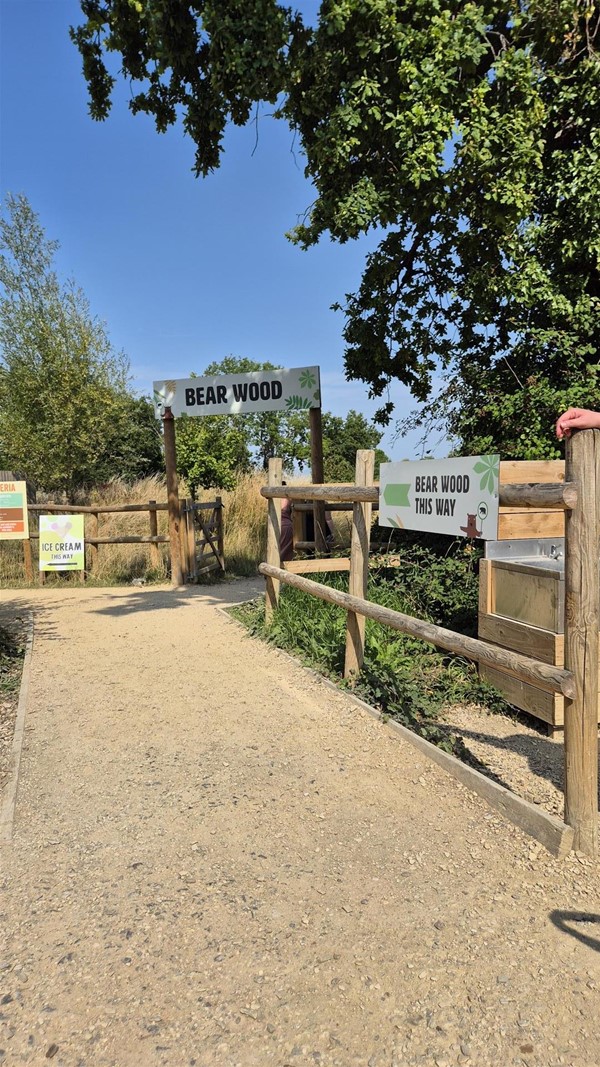 Image of wooden fencing and signs.