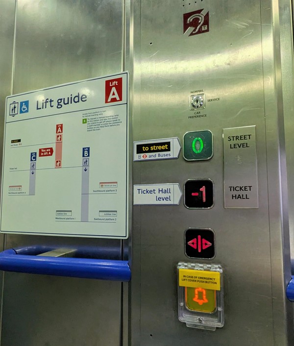 Image of panel and lift guide inside Lift A which goes from street to ticket hall