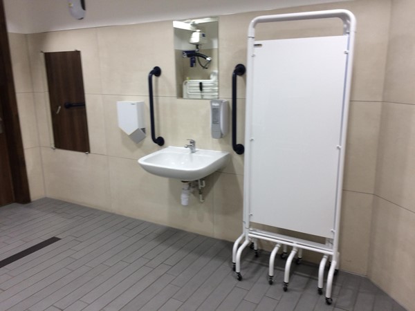 Changing Places. It was nice to put a screen up in from of the door to give use extra privacy.