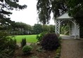 Picture of a wooden arch in a garden