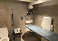 Adaptive toilet and adult changing area