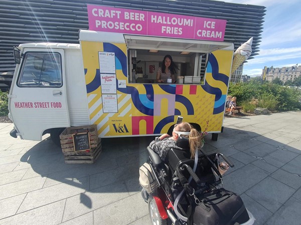 Picture of Claire in front facing the halloumi and ice cream food van