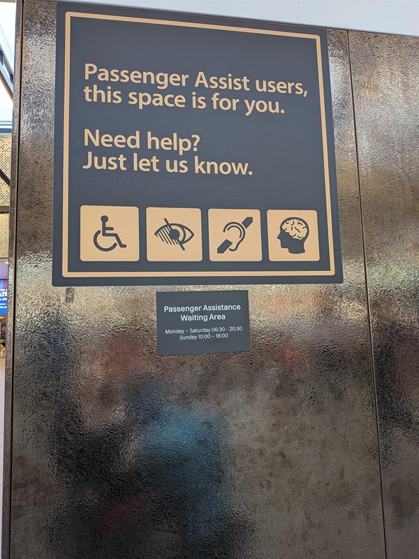 image of passenger assistance meeting point signage