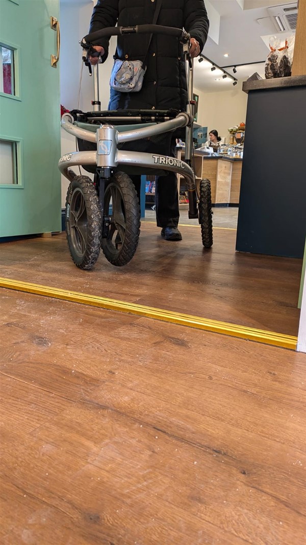 This shows the width of the cafe to shop access.