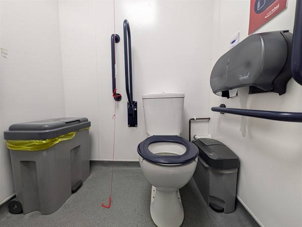 image of toilet seat in the accessible toilet