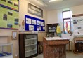 Display about Haroldswick Primary School with artefacts and information boards on the wall.