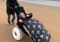 Picture of a person in a beach wheelchair