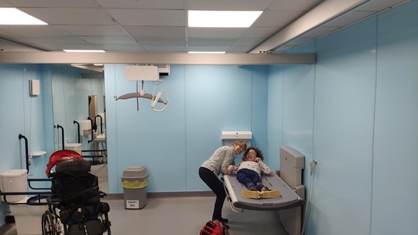 My daughter and wife using the Changing Place at the Show Ground