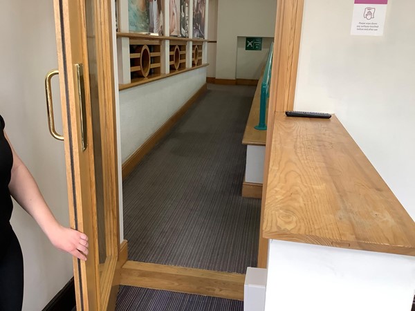 Picture of someone opening a door