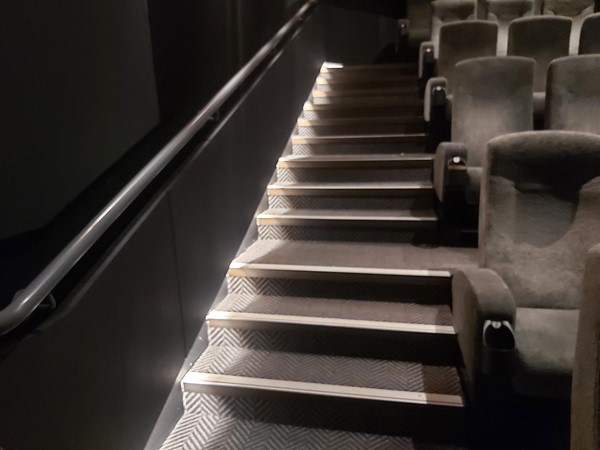 Image of a row of stairs in a movie theatre