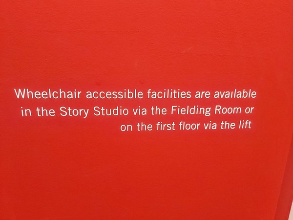 Image of a sign saying where the wheelchair accessible facilities are.