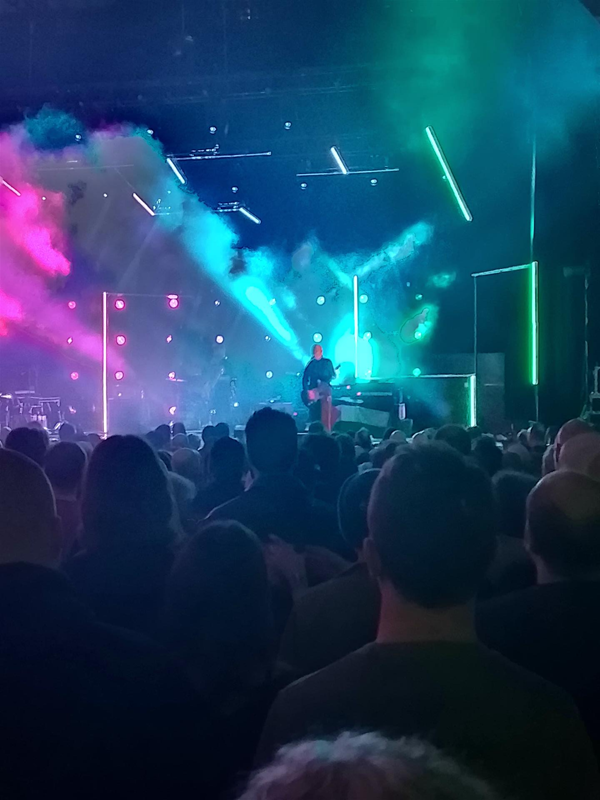 Image of a guitarist on a stage