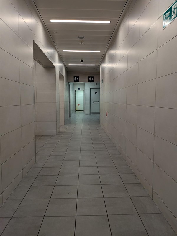 Image of a corridor leading to the toilets