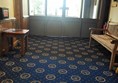 Inside the entrance doors.