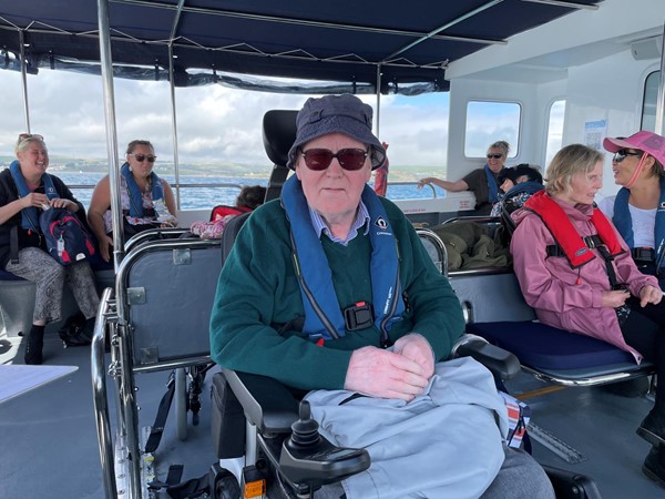 My husband enjoying the boat trip .