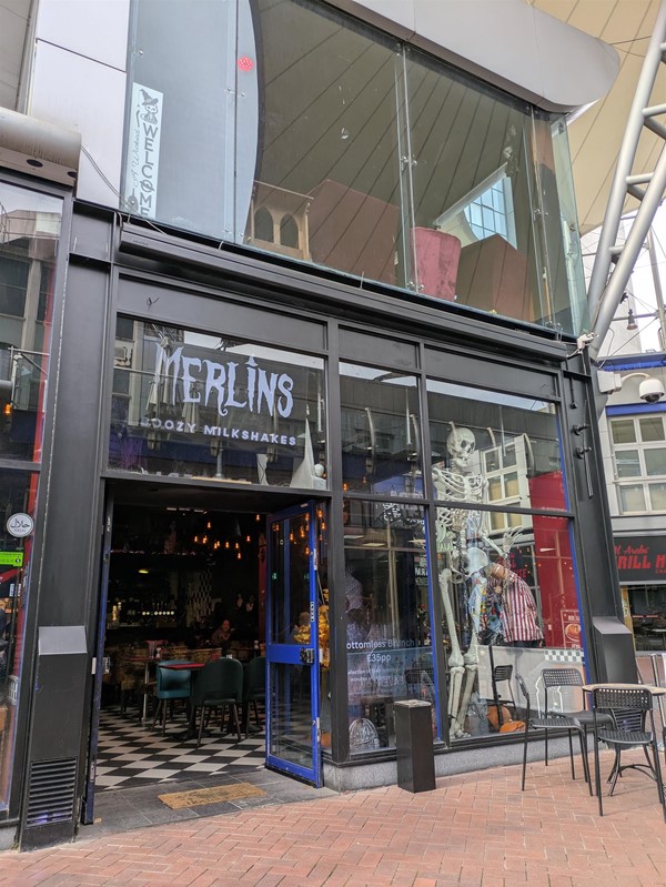 Image of entrance to Merlins