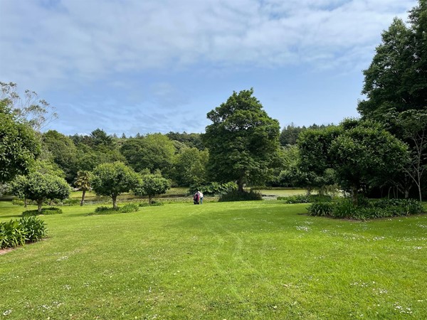 The grass slope to the first lake