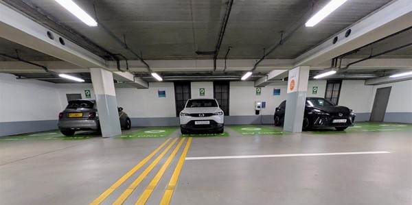 Image of eight EV charging parking spaces