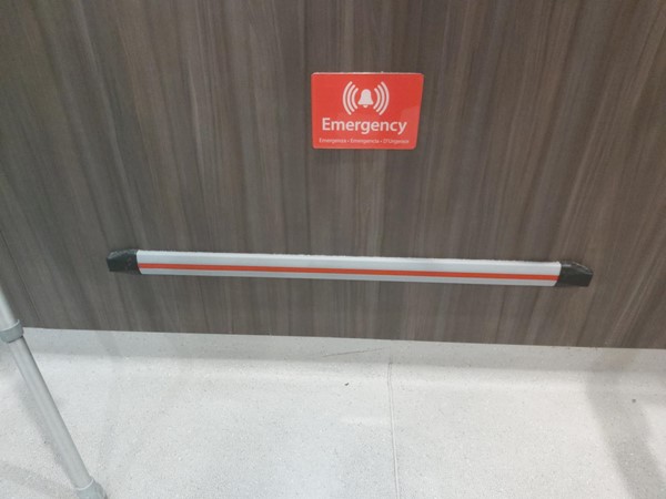 Image of the emergency call bar in the accessible toilet.