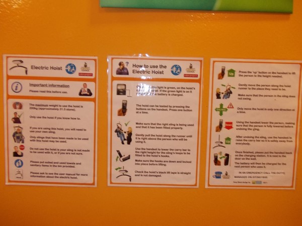 Instructions for equipment and emergency call number are displayed in the Changing Places toilet.