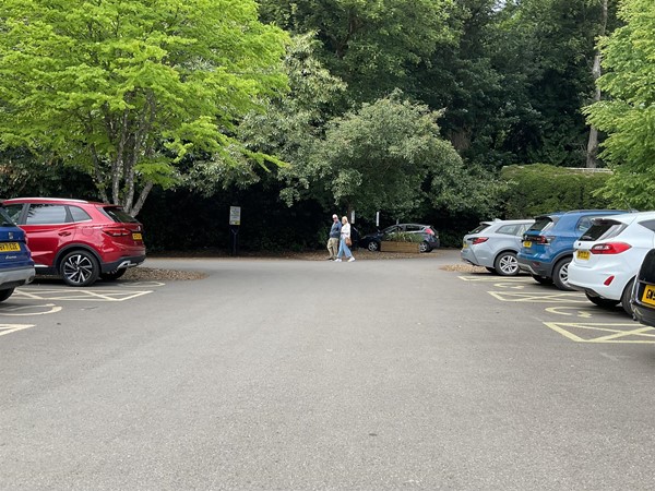 At the car park area, drive along to the third parking area on your left, as the few disabled bays are here, at the far end of the row. Ahead of you, just before you walk right, to reach the main entrance for the hotel, you will find a good dozen or so electric charging points.