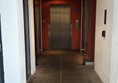 Lift with corridor doors propped open.