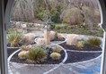 A circle garden with a clear walkway (garden of contemplation)