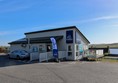 Front entrance and blue badge parking.