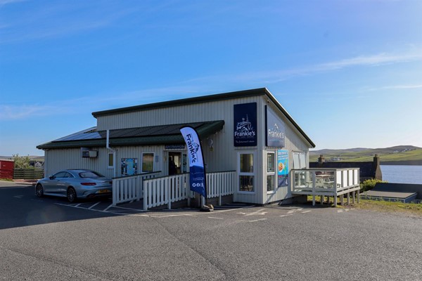 Front entrance and blue badge parking.