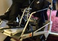 Stair climber being used. The figure in the chair is me and the staff pictured have given consent to use all attached photos
