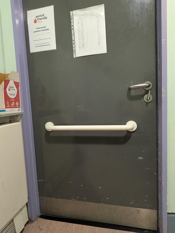 Image of door from the inside of the accessible toilet