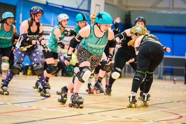 A jammer breaking away from the pack.

Photo courtesy of Mark Harris Photography (thanks Mark!)